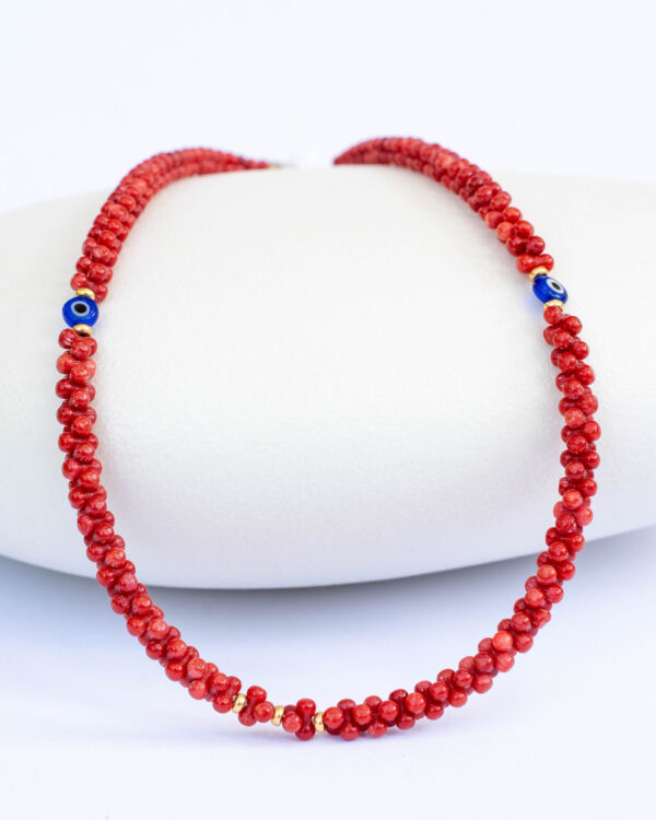 Red coral necklace with a good eye